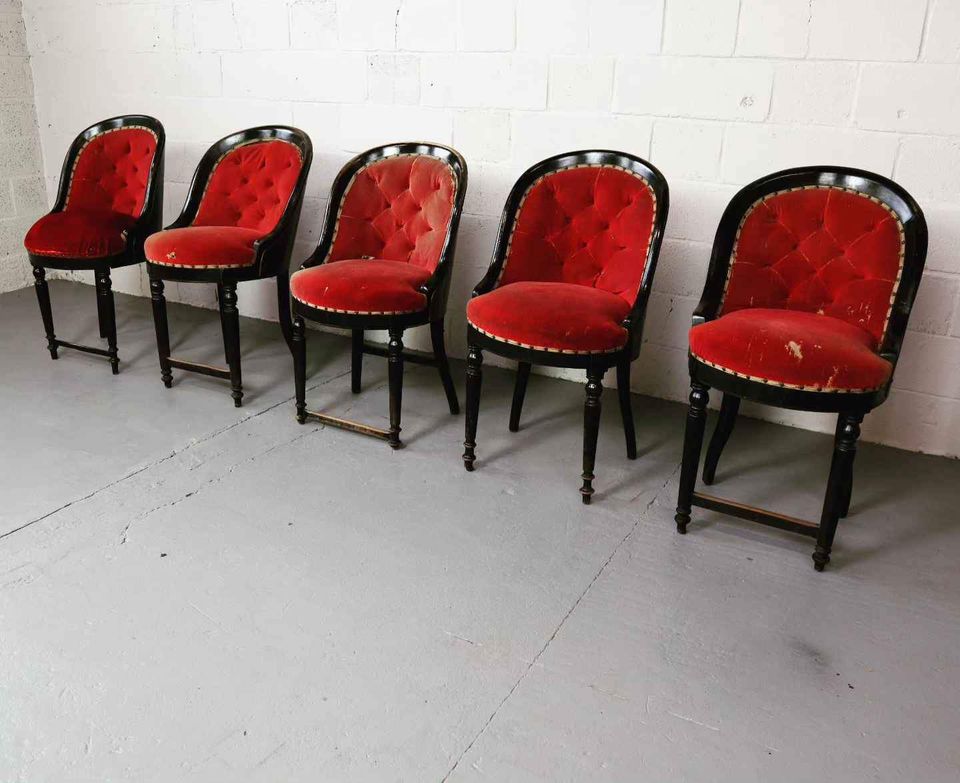 Set of five antique theater chairs