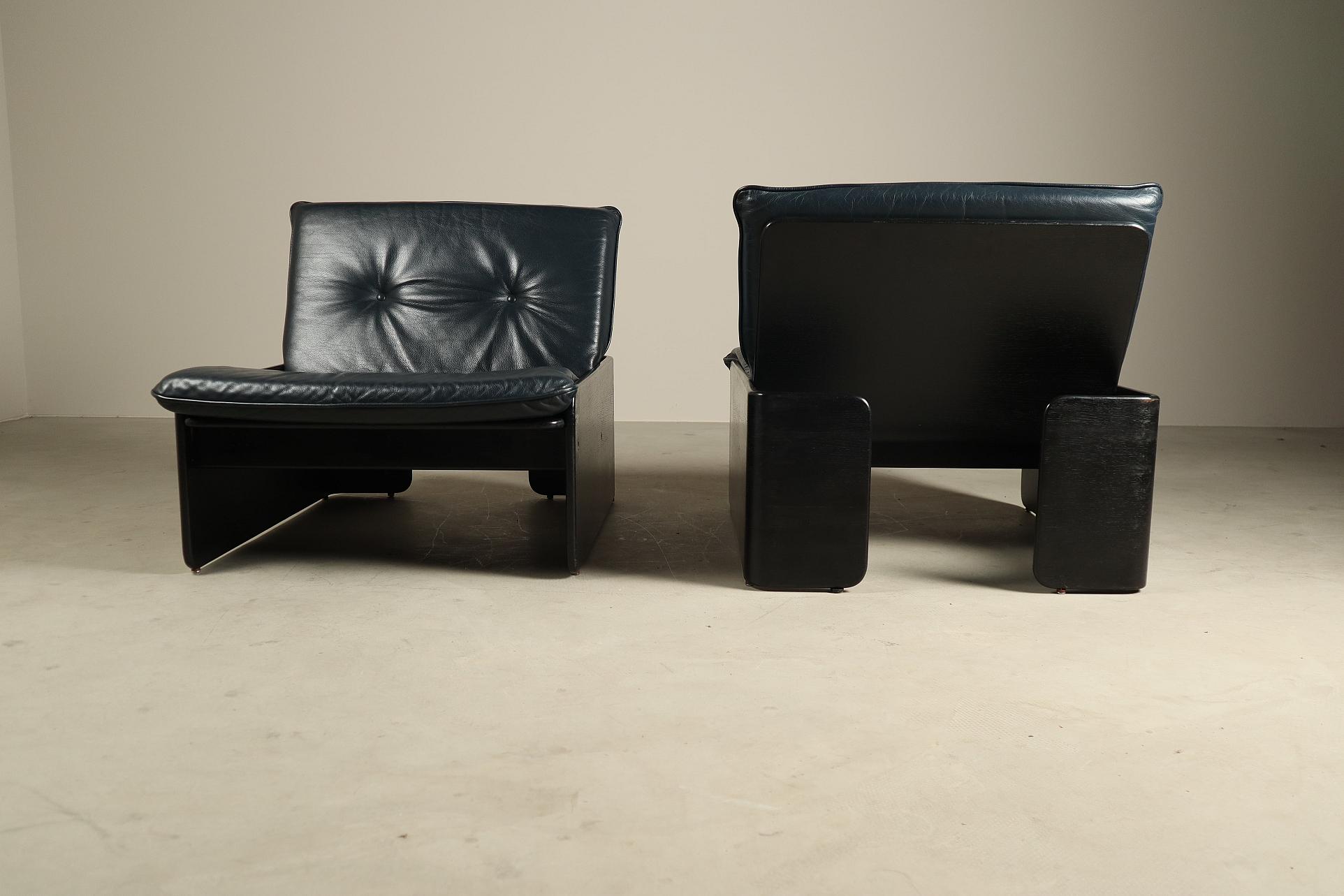 Pair of easy Chairs by Erik Deforce