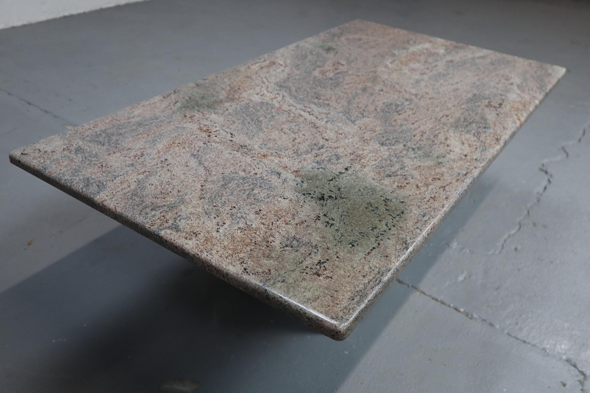 Minimalist pink granite coffee table